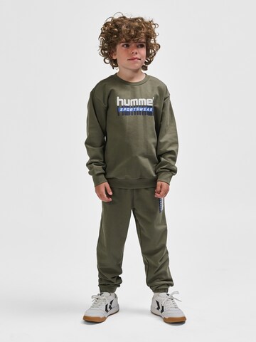 Effilé Pantalon 'TUKAS' Hummel en vert