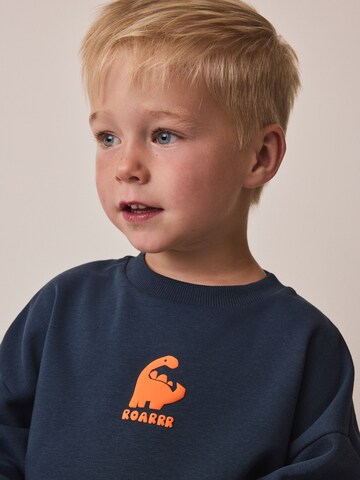 Set Next en bleu