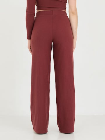 ABOUT YOU x Sofia Tsakiridou Wide leg Trousers 'Leni' in Brown