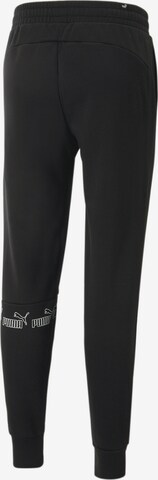 Effilé Pantalon de sport PUMA en noir