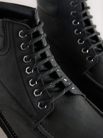 Boots stringati di Next in nero