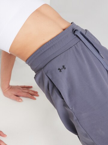 UNDER ARMOUR Lużny krój Spodnie sportowe 'Motion Open' w kolorze szary