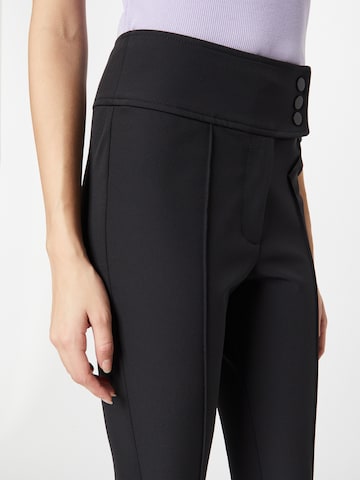 évasé Pantalon River Island en noir