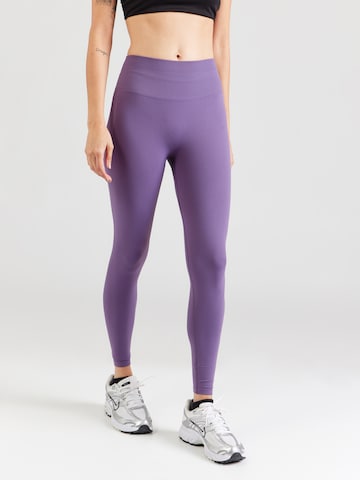 Skinny Pantalon de sport Fabletics en violet : devant