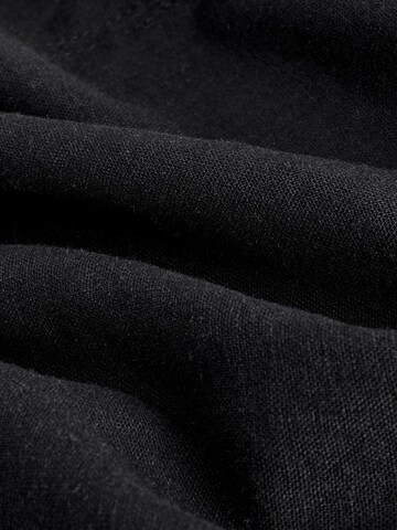 Combinaison Next en noir