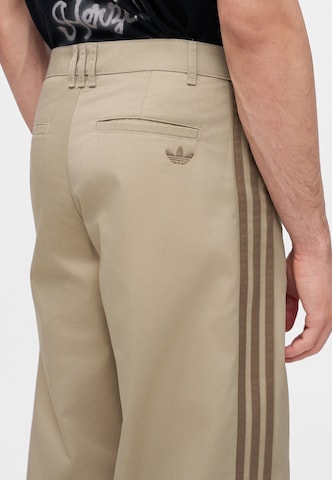 zaļš ADIDAS ORIGINALS Vaļīgs piegriezums Bikses