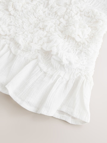 Haut Next en blanc