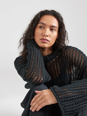 ABOUT YOU x Kamila Šikl Sweater 'Philippa' in Black