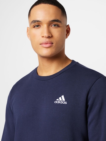 ADIDAS SPORTSWEAR Sportsweatshirt 'Essentials' i blå