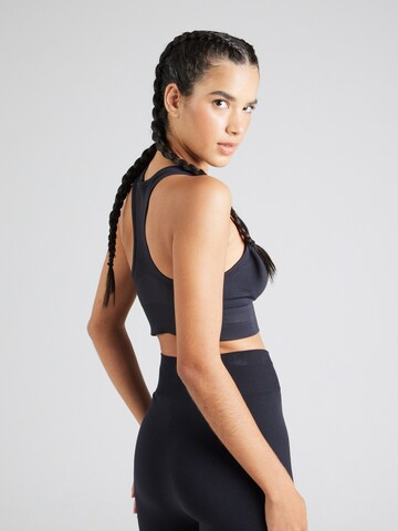 Bustier Soutien-gorge de sport 'Vanish' UNDER ARMOUR en noir