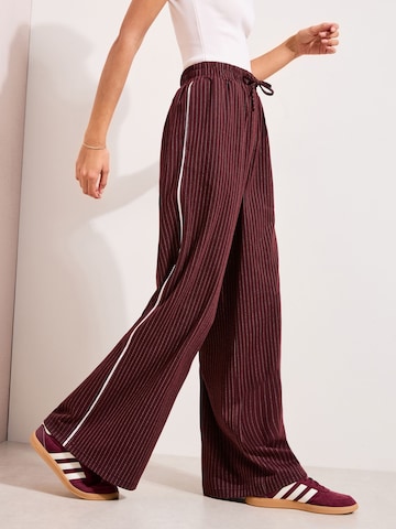 Wide leg Pantaloni di Friends Like These in rosso