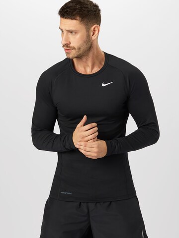 NIKE Regular Fit Sportshirt in Schwarz: predná strana