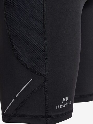 Coupe slim Pantalon de sport 'RACE' Newline en noir