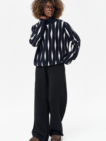 Blue Shadow Sweater in Black