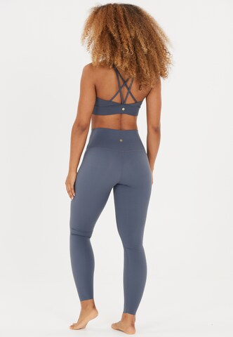 Athlecia Skinny Sportbroek 'Stay' in Blauw