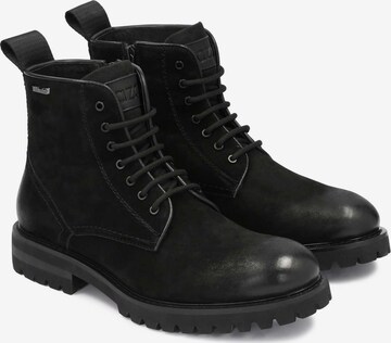 Boots stringati di Kazar in nero