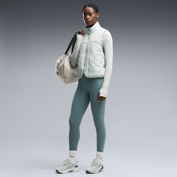 PUMA Skinny Sports trousers in Green