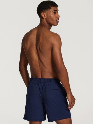 Shiwi Board Shorts 'easy mike solid 4-way stretch' in Blue