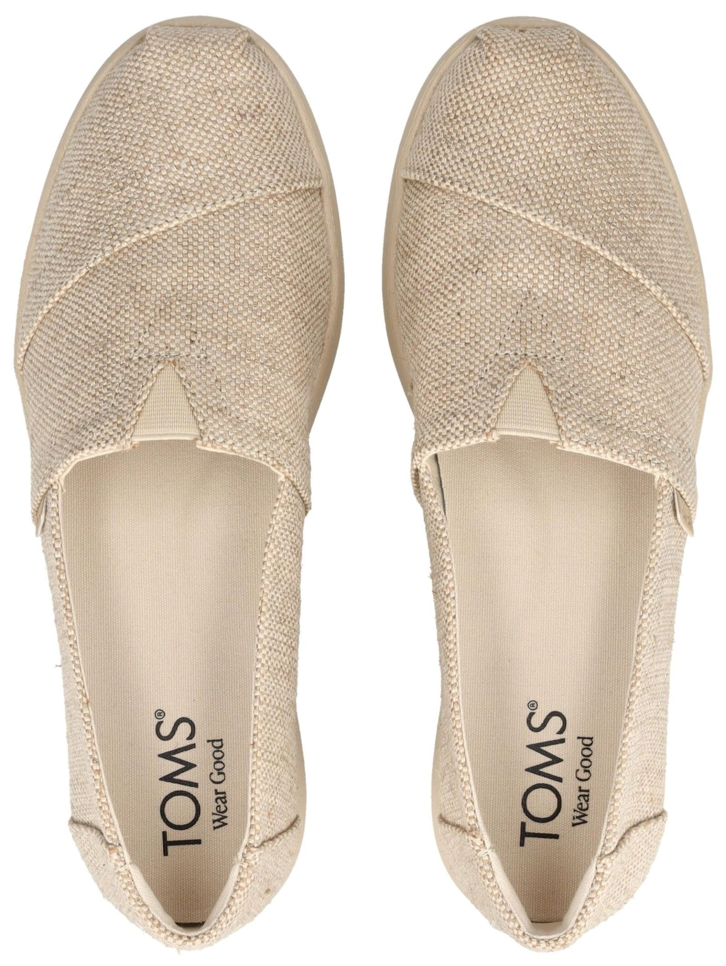 Slipper di TOMS in beige
