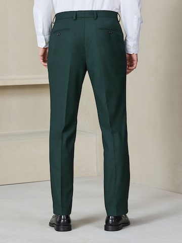 regular Pantaloni con piega frontale di Next in verde