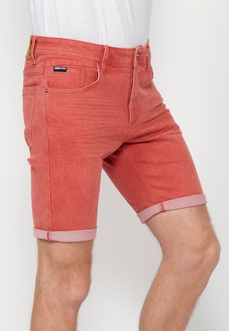 Regular Jeans 'Bermuda' de la KOROSHI pe roșu
