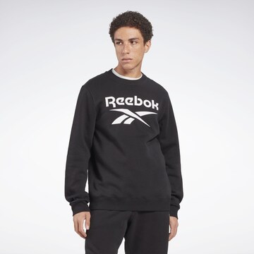 Felpa sportiva 'IDENTITY' di Reebok in nero: frontale
