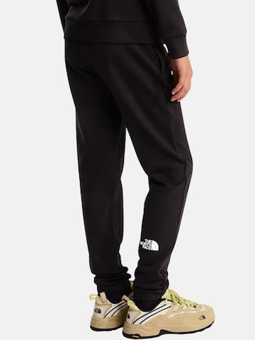 THE NORTH FACE Normalny krój Spodnie 'THE NORTH FACE kids TEEN SIMPLE LT JOGGER PANTALONE' w kolorze czarny