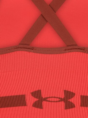 Bustino Reggiseno sportivo di UNDER ARMOUR in rosso