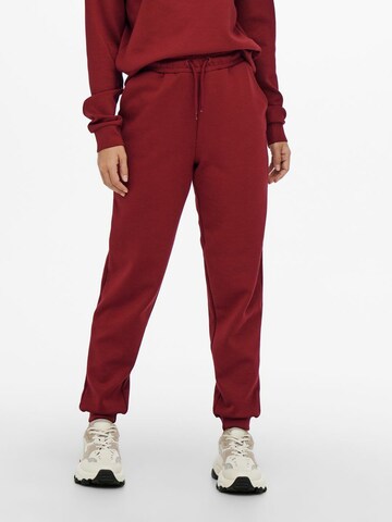 Effilé Pantalon de sport ONLY PLAY en rouge