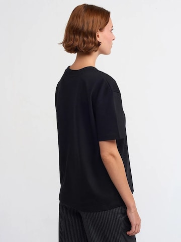 Maglietta 'T-Shirts' di Dilvin in nero
