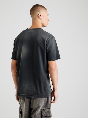 DIESEL T-shirt 'ADJUST-T1' i svart