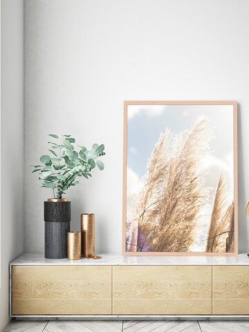 Liv Corday Image 'Against Blue Sky' in Brown