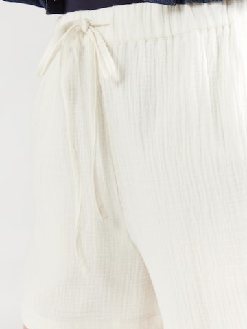 balta Calvin Klein Jeans Laisvas Kelnės