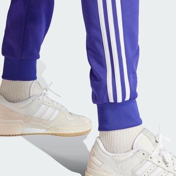 ADIDAS ORIGINALS Tapered Trousers 'Adicolor Classics SST' in Blue