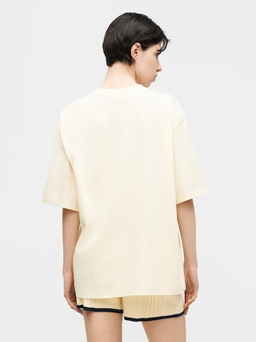 ADIDAS ORIGINALS - Camiseta talla grande 'Ess' en beige