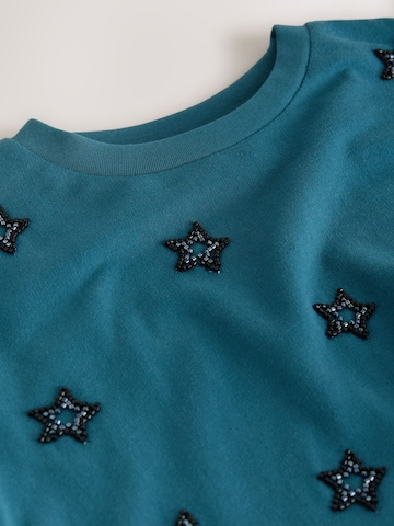 Next - Blusa en azul