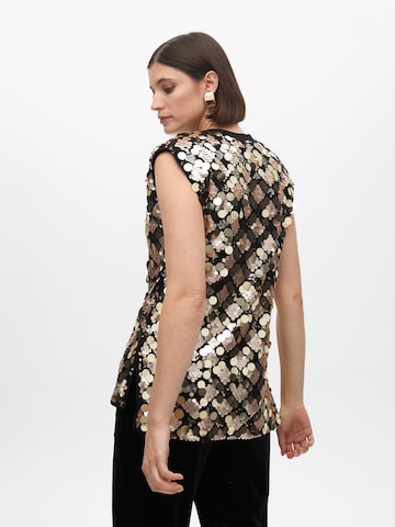 Haut Lola Casademunt en or