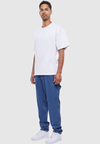 Tapered Jeans di Karl Kani in blu