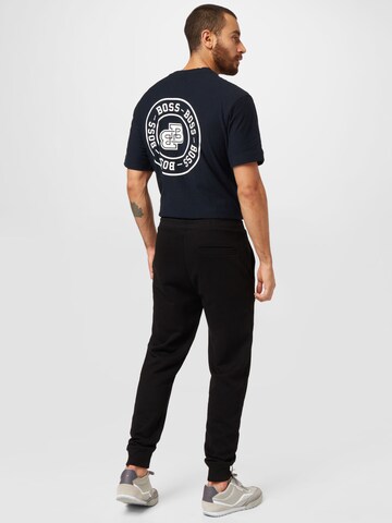 HUGO - Tapered Pantalón 'Doak' en negro