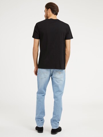 GUESS Slimfit Jeans in Blau