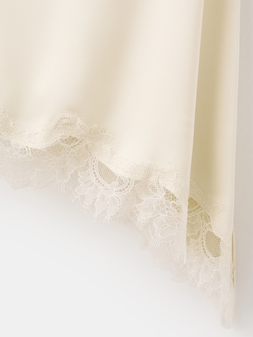 Top 'Tity' de la MANGO pe bej