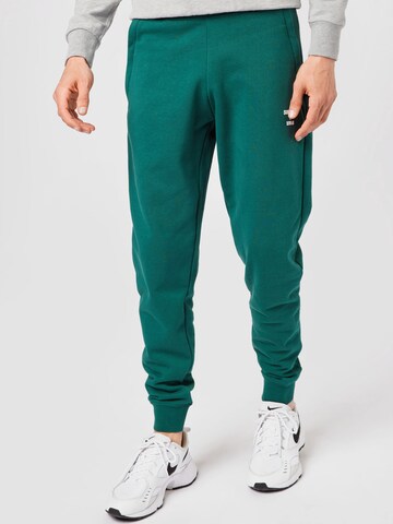 Superdry Ozke Športne hlače | zelena barva: sprednja stran