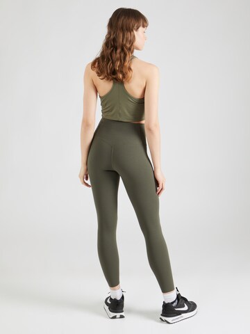 Skinny Pantaloni sport 'ZENVY' de la NIKE pe verde