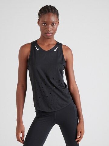 Top sportivo 'AeroSwift' di NIKE in nero: frontale
