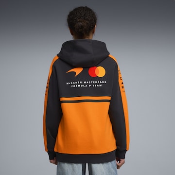 PUMA Sweatshirt 'McLaren Mastercard F1 Team Replica' in Oranje