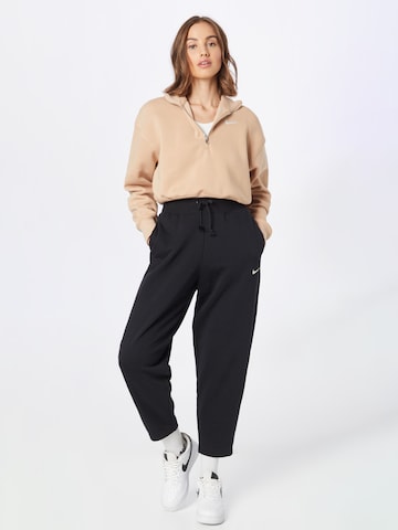 Nike Sportswear Дънки Tapered Leg Панталон 'PHNX FLC' в черно