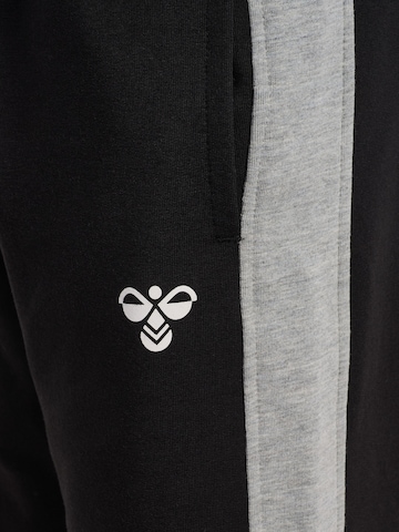 Effilé Pantalon 'Essen' Hummel en noir