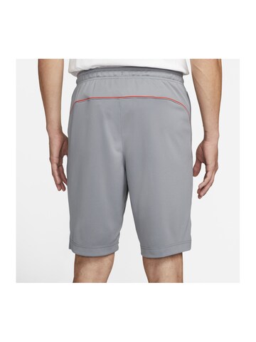 NIKE Regular Sports trousers in Grey