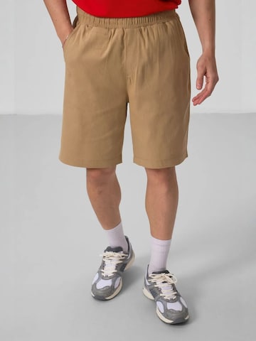 Regular Pantalon chino Tommy Life en marron