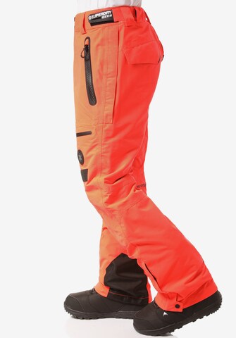 Regular Pantaloni sport 'Pro Racer Rescue' de la Superdry Snow pe portocaliu
